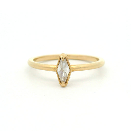 14K yellow gold solitaire ring featuring a 0.15ct diamond-shaped rose-cut moissanite, organic textured gallery, and polished 1.7mm soft domed band.