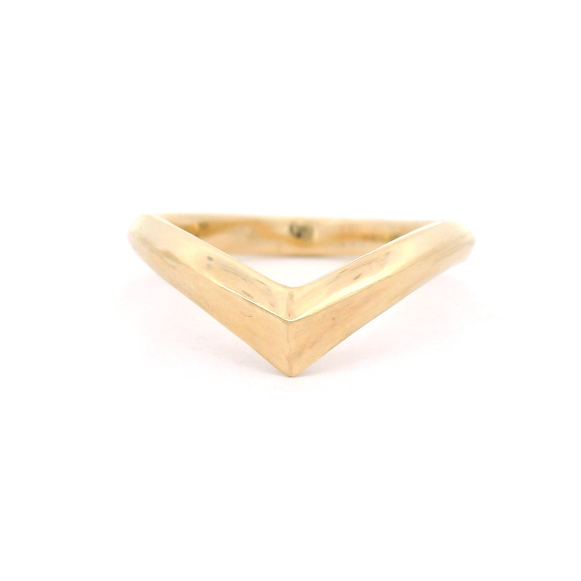 10K yellow gold chevron wedding band with four polished panels in a diadem-inspired design and elegant contoured profile.