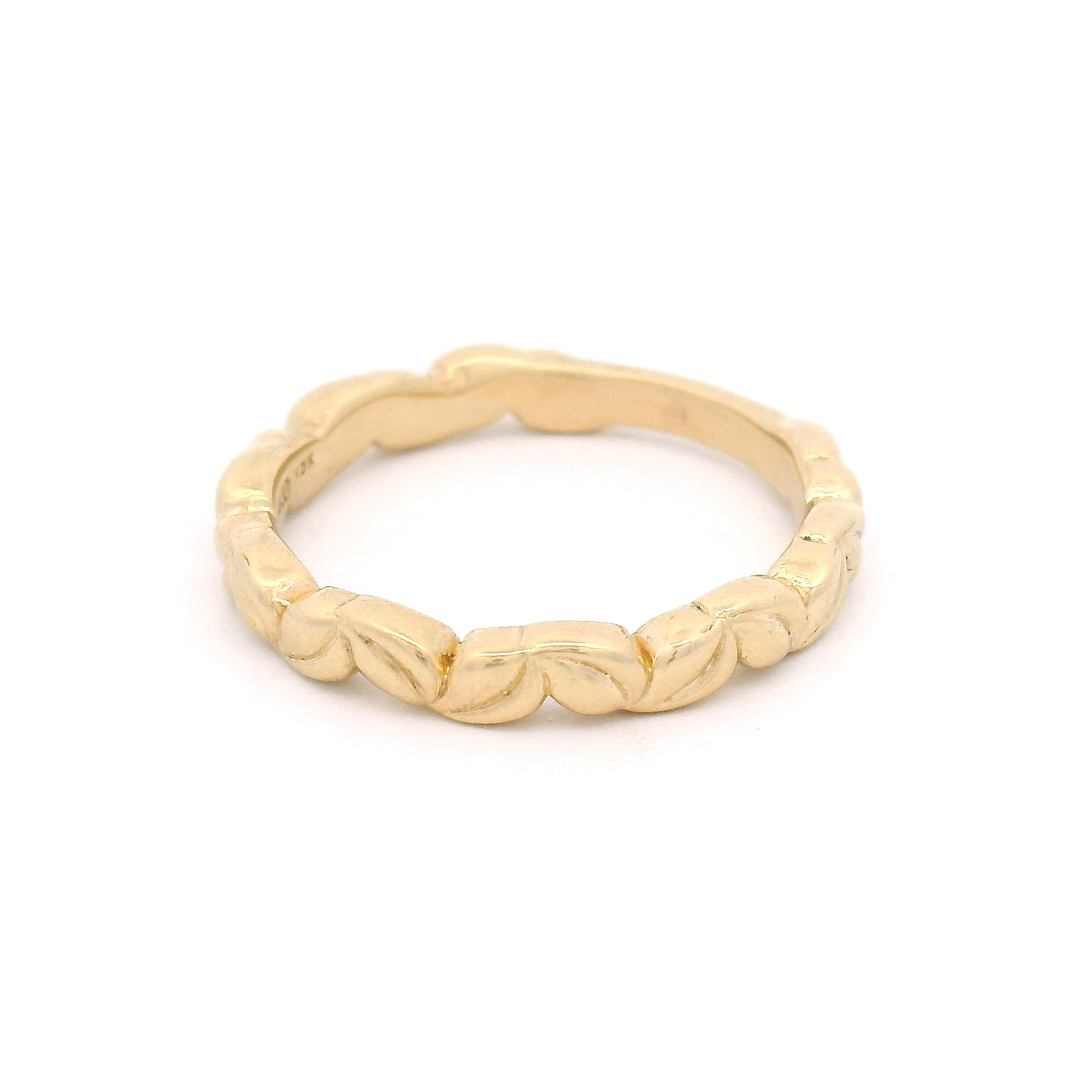 10K yellow gold 3mm wedding band with an intricately carved leaf pattern and nature-inspired botanical detailing.