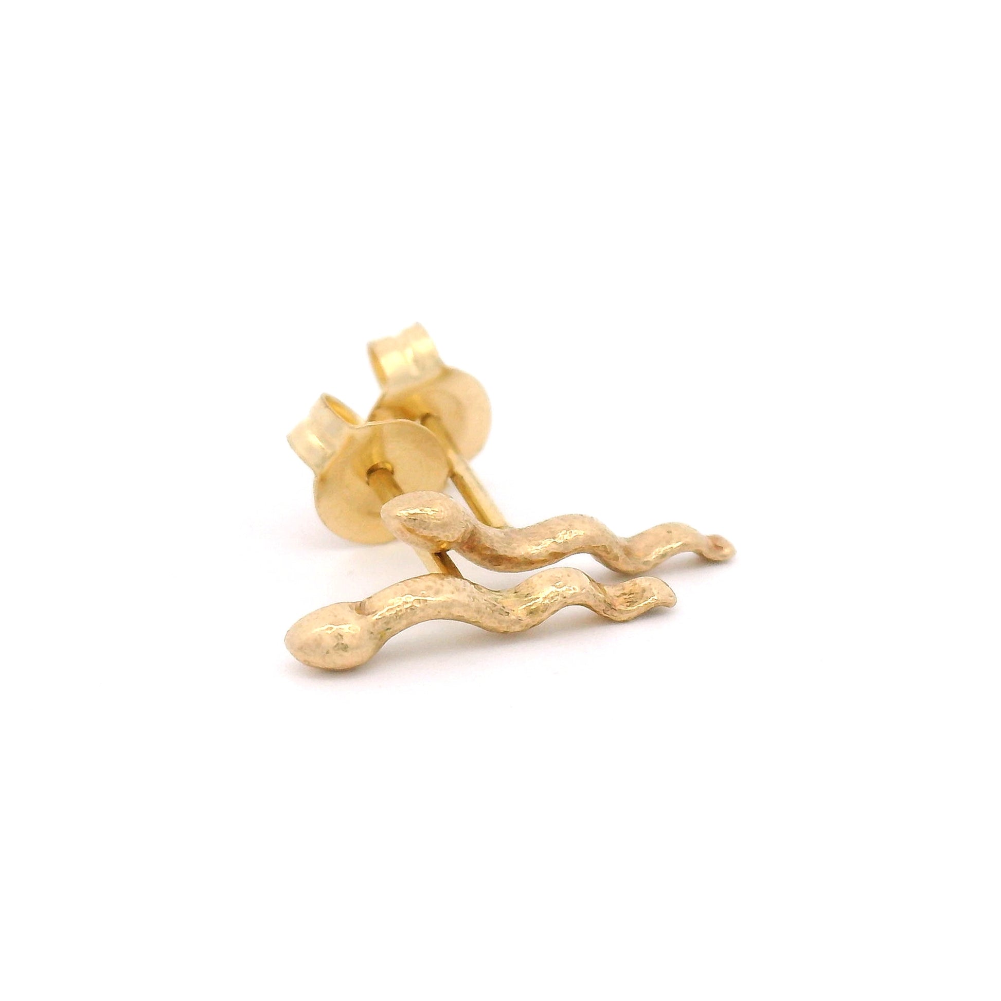 14K yellow gold carved snake stud earrings measuring approximately 12mm long with detailed sculpted serpent design.