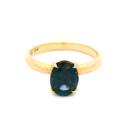 14K Yellow Textured Solitaire with Oval 6mm x 8mm Montana Blue Sapphire