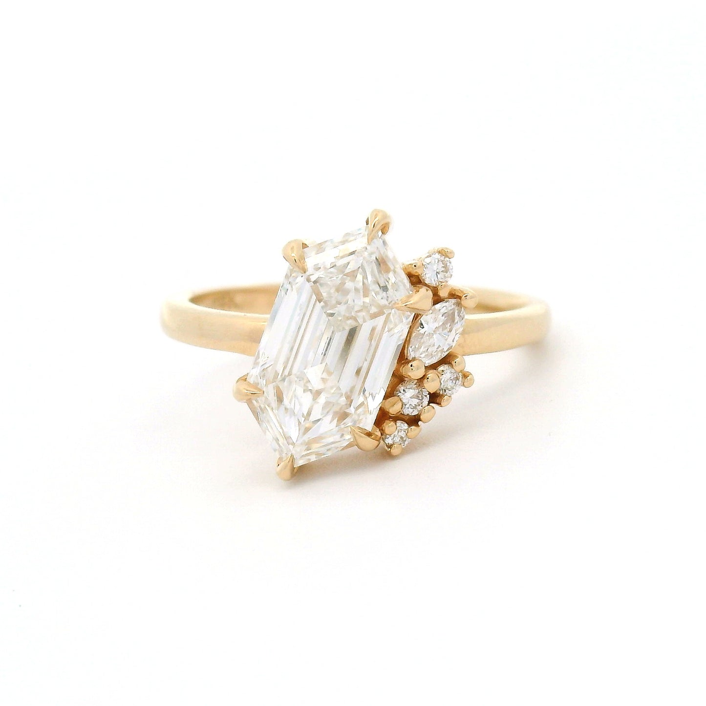 14K yellow gold engagement ring featuring a 2.03ct lab-grown Dutch marquise-cut diamond with an asymmetrical cluster of five mixed-cut lab-grown diamond accents on a delicate 1.8mm band.