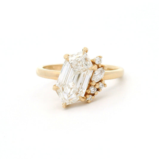 14K yellow gold engagement ring featuring a 2.03ct lab-grown Dutch marquise-cut diamond with an asymmetrical cluster of five mixed-cut lab-grown diamond accents on a delicate 1.8mm band.