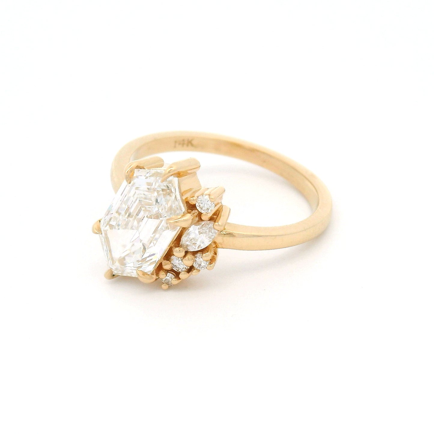 14K yellow gold engagement ring featuring a 2.03ct lab-grown Dutch marquise-cut diamond with an asymmetrical cluster of five mixed-cut lab-grown diamond accents on a delicate 1.8mm band.
