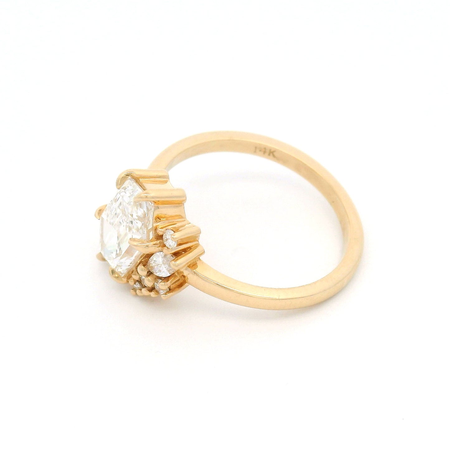 14K yellow gold engagement ring featuring a 2.03ct lab-grown Dutch marquise-cut diamond with an asymmetrical cluster of five mixed-cut lab-grown diamond accents on a delicate 1.8mm band.
