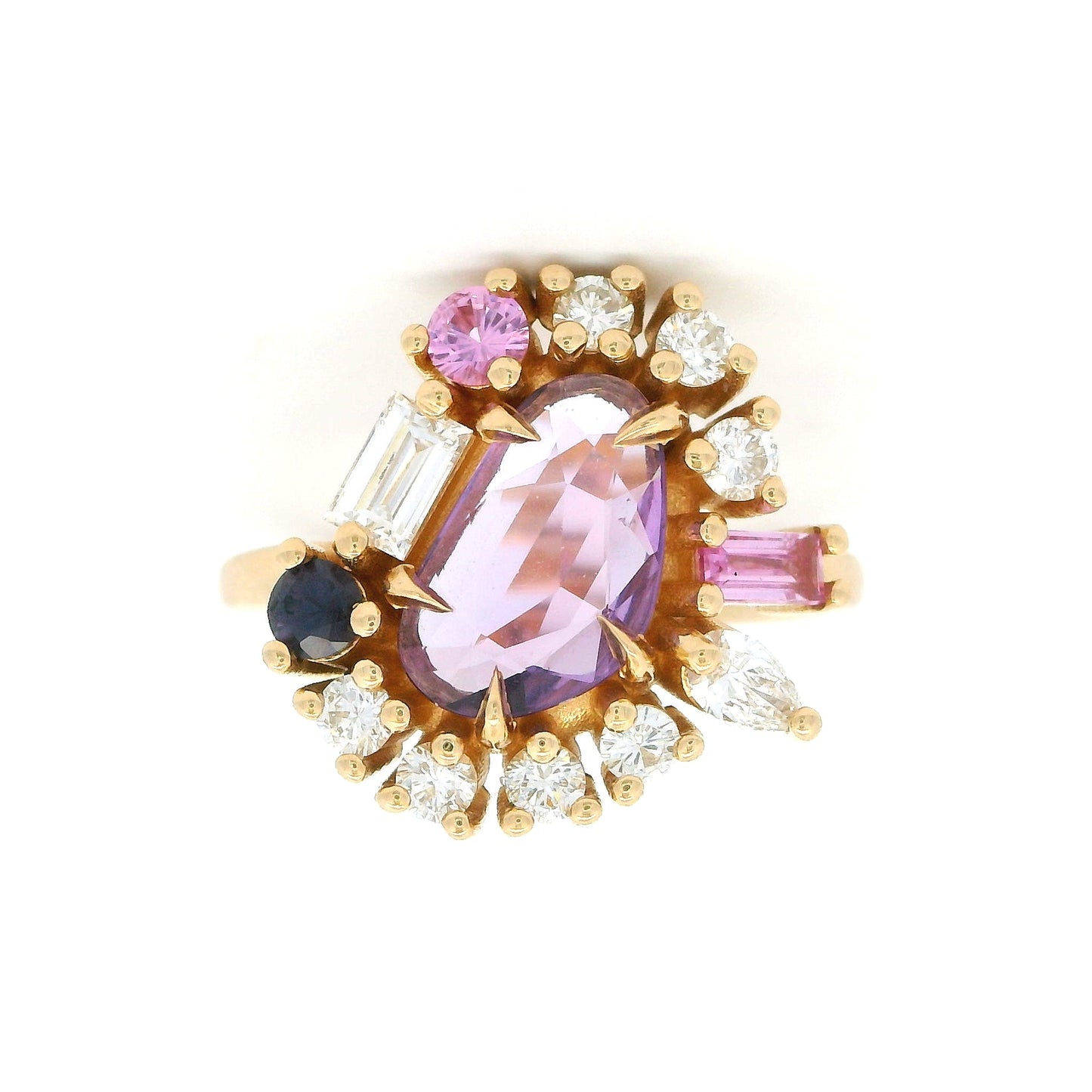 14K yellow gold asymmetrical engagement ring featuring a natural 1.01ct triangular purple sapphire with a halo of mixed-cut pink and purple sapphires and lab-grown diamonds totalling 0.93cts.