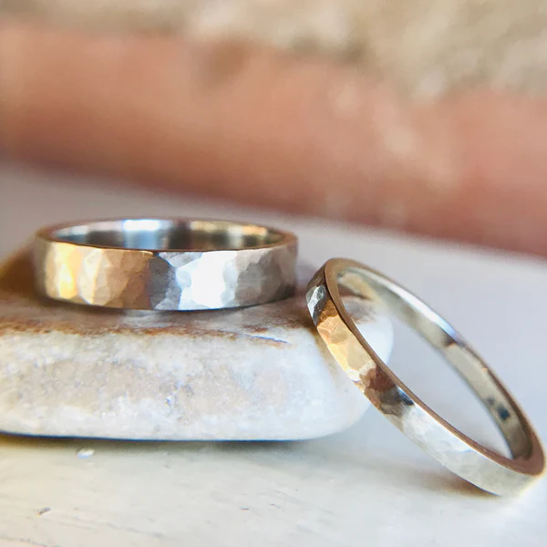 14k White 4mm Wide Flat Hammered Wedding Band.  Shown with narrower version.