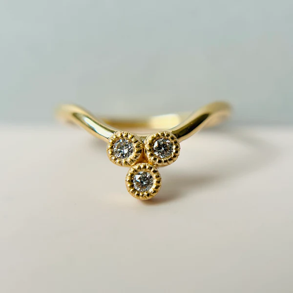 14k Yellow Contoured Band with a Colourless Diamond Trio.  Reverse view.