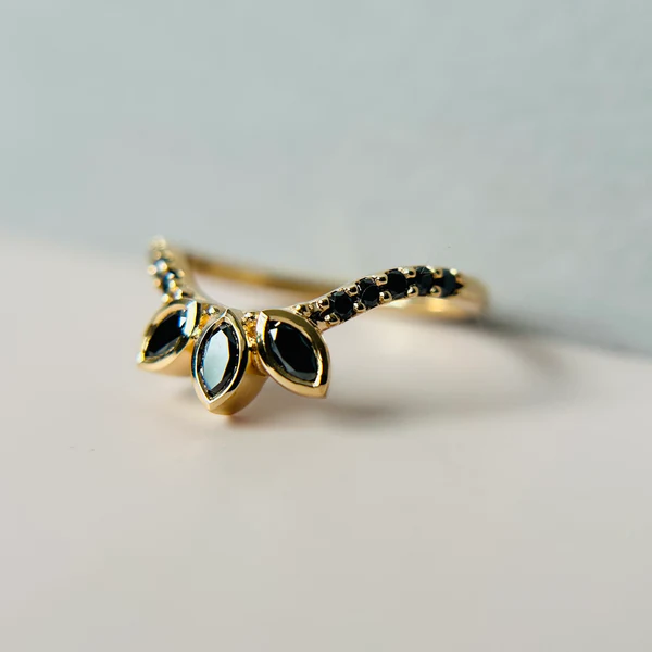 14k Yellow Contoured Band with 3 Black Marquise Diamonds and 10 Black Accent Diamonds.  From an angle.
