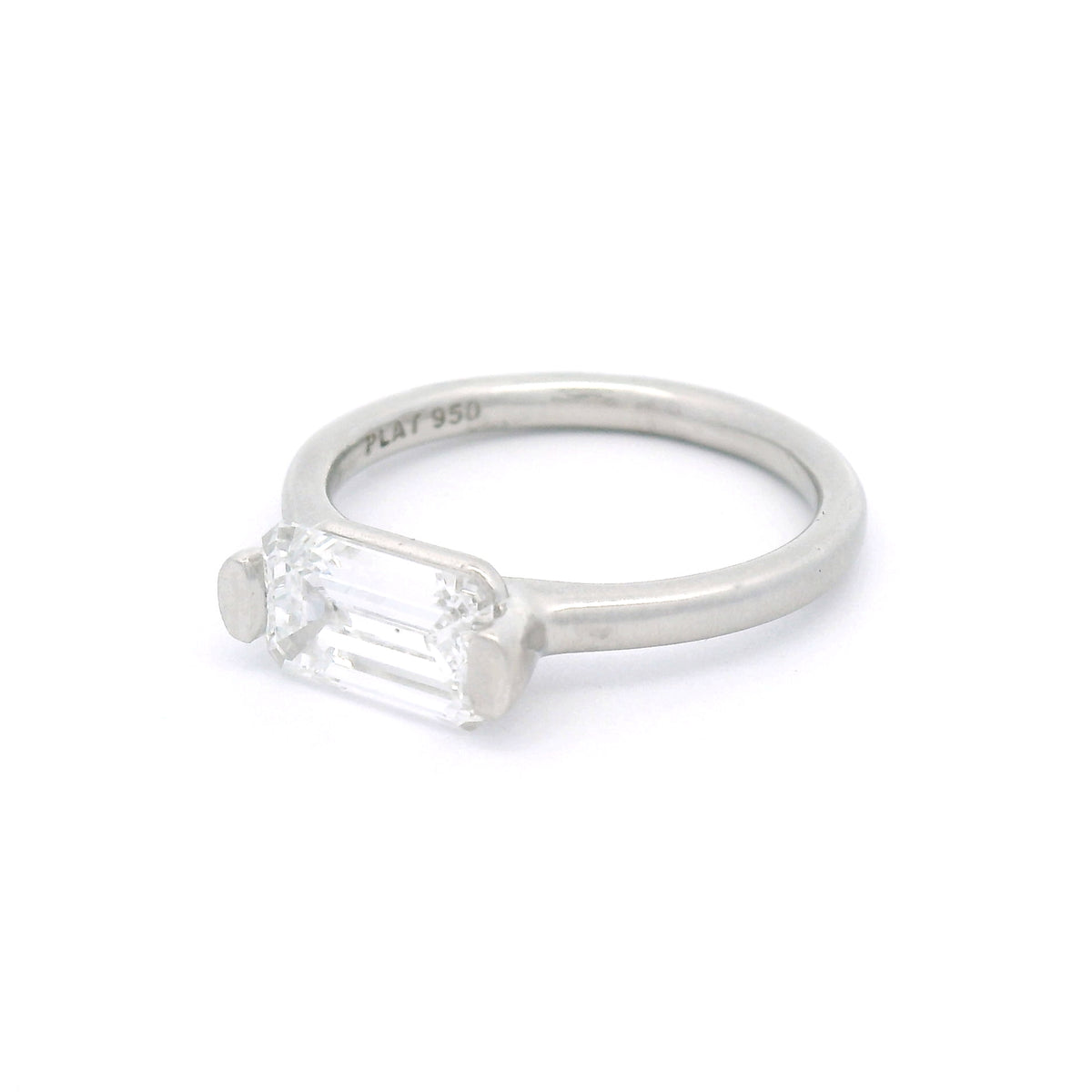 Platinum bar-set solitaire engagement ring with a 1.58ct lab-grown emerald-cut diamond, VVS1 clarity, D colour and rounded 2mm satin band.