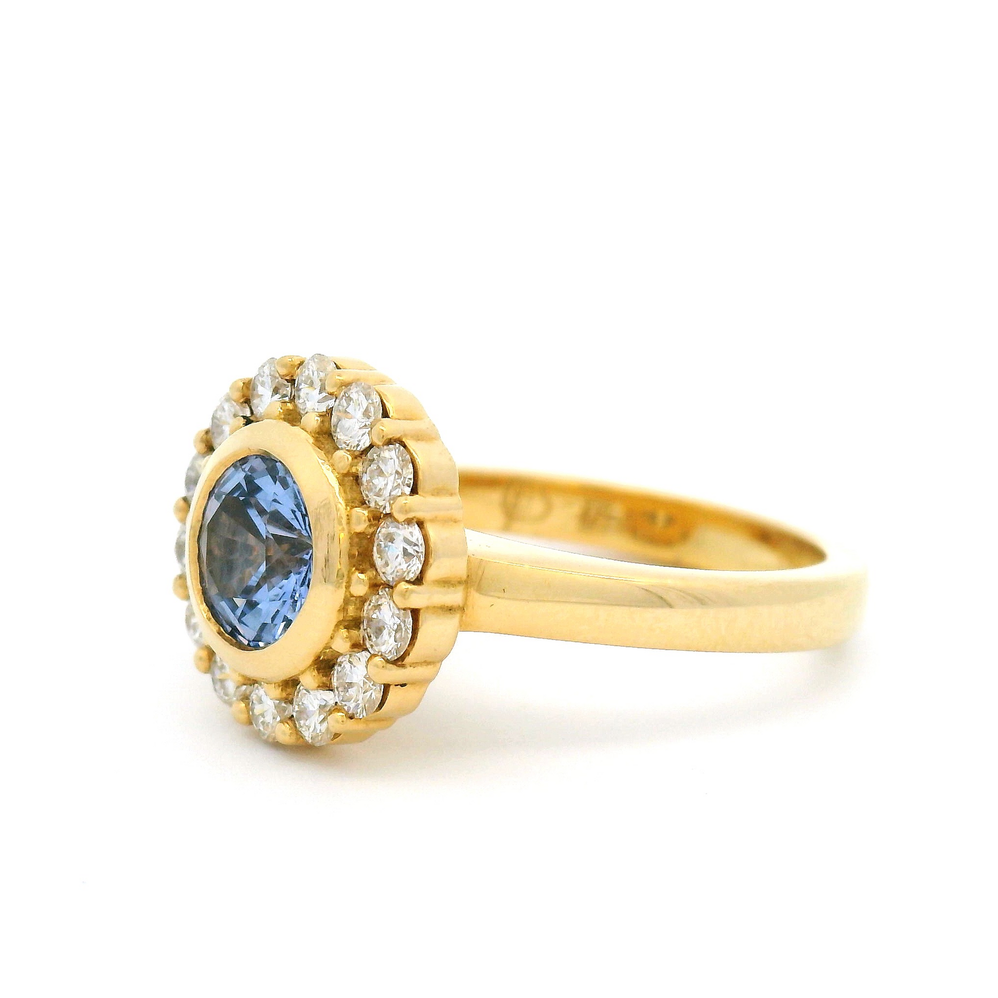 18k Yellow Bezel Set Halo Ring with 0.98ct Round Blue Sapphire and Accent Diamonds