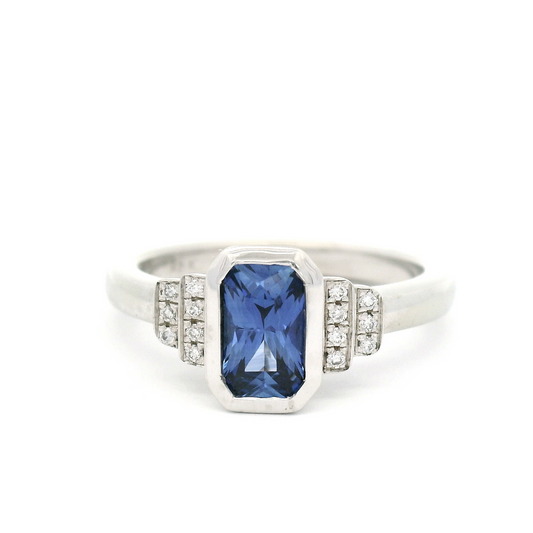 18k White Engagement Ring with 0.77ct Vibrant Blue Emerald Cut Sapphire and Accent Diamonds