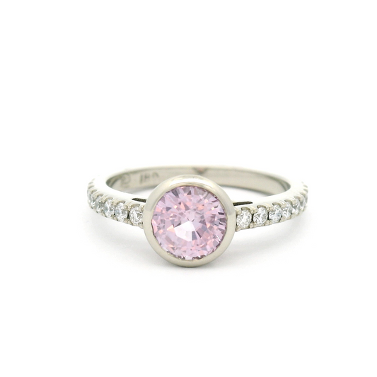 18k White Bezel Set Ring with 1.33ct Pink Sapphire and Accent Diamonds