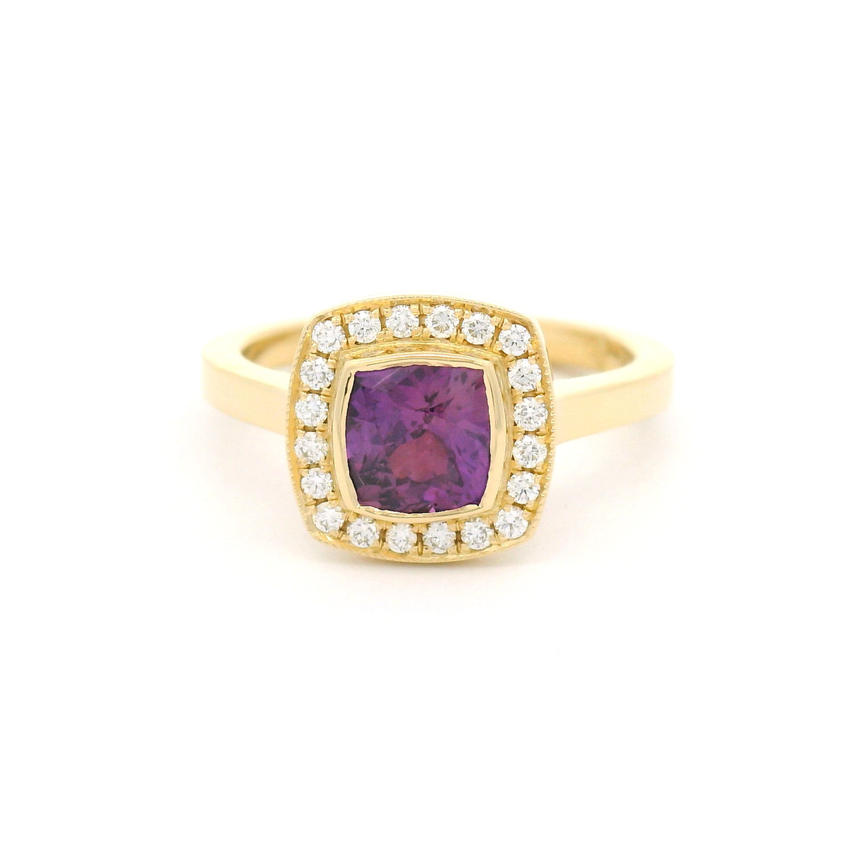 18K yellow gold bezel-set engagement ring with a natural 1.28ct purple square cushion-cut sapphire, 20 natural diamonds, milgrain halo border and flush-fit design.