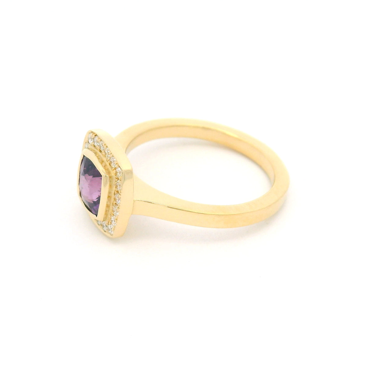 18K yellow gold bezel-set engagement ring with a natural 1.28ct purple square cushion-cut sapphire, 20 natural diamonds, milgrain halo border and flush-fit design.