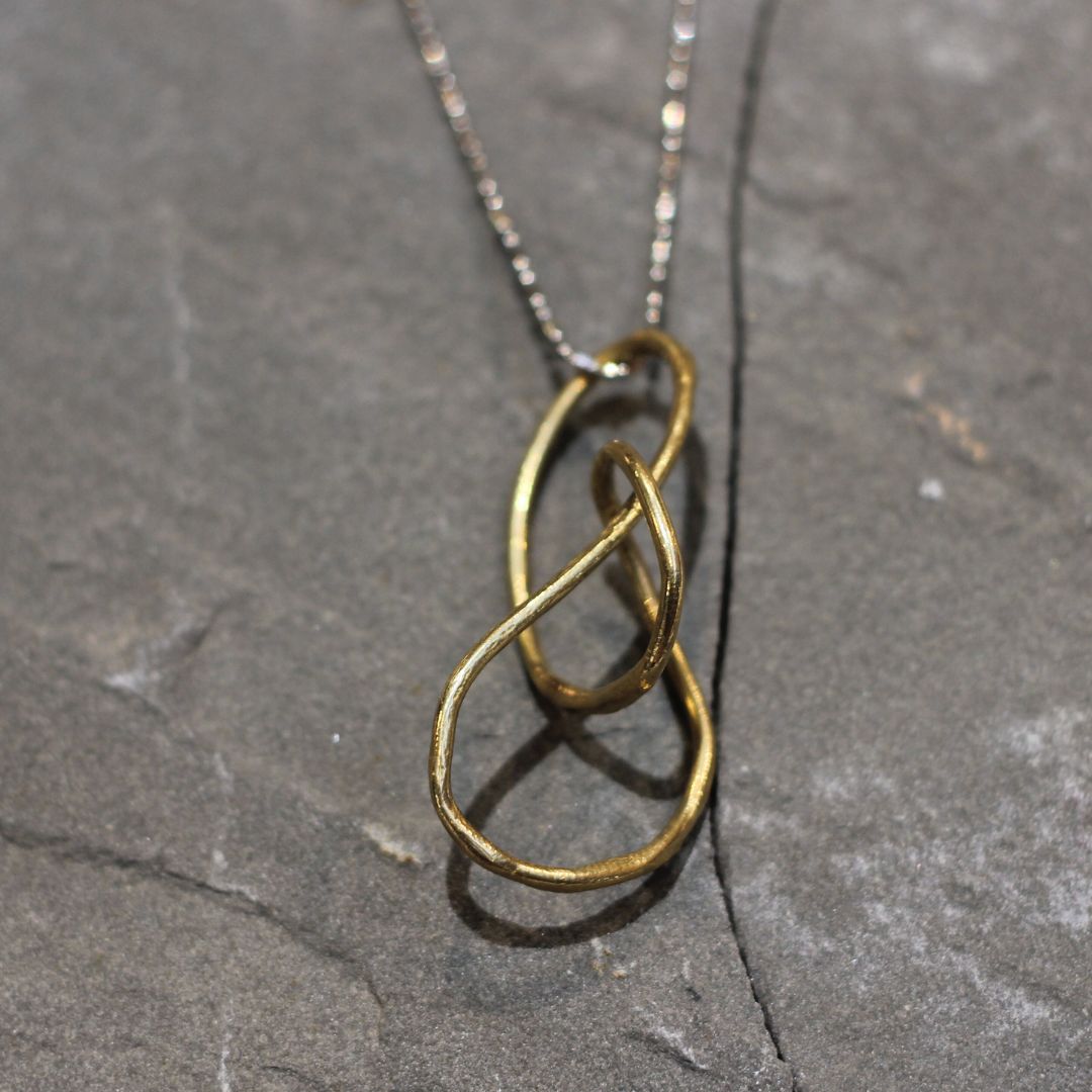 Loveknot - Sculpted Brass Swirl Necklace