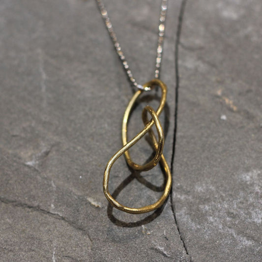 Loveknot - Sculpted Brass Swirl Necklace