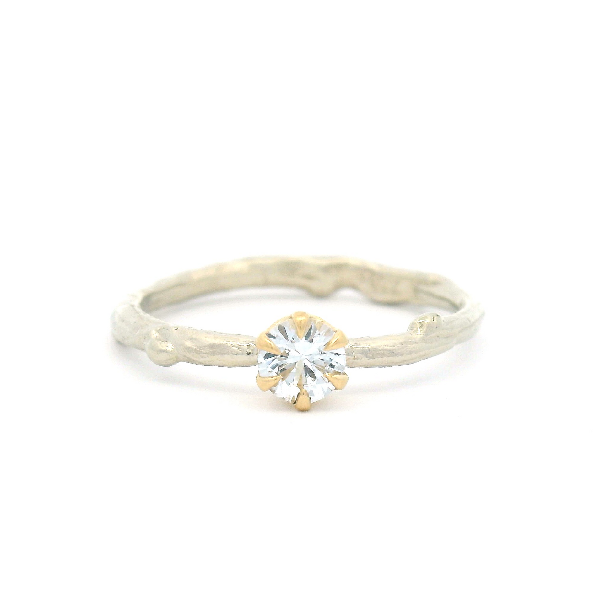 10k White and Yellow Organic Solitaire with 0.25ct White Sapphire
