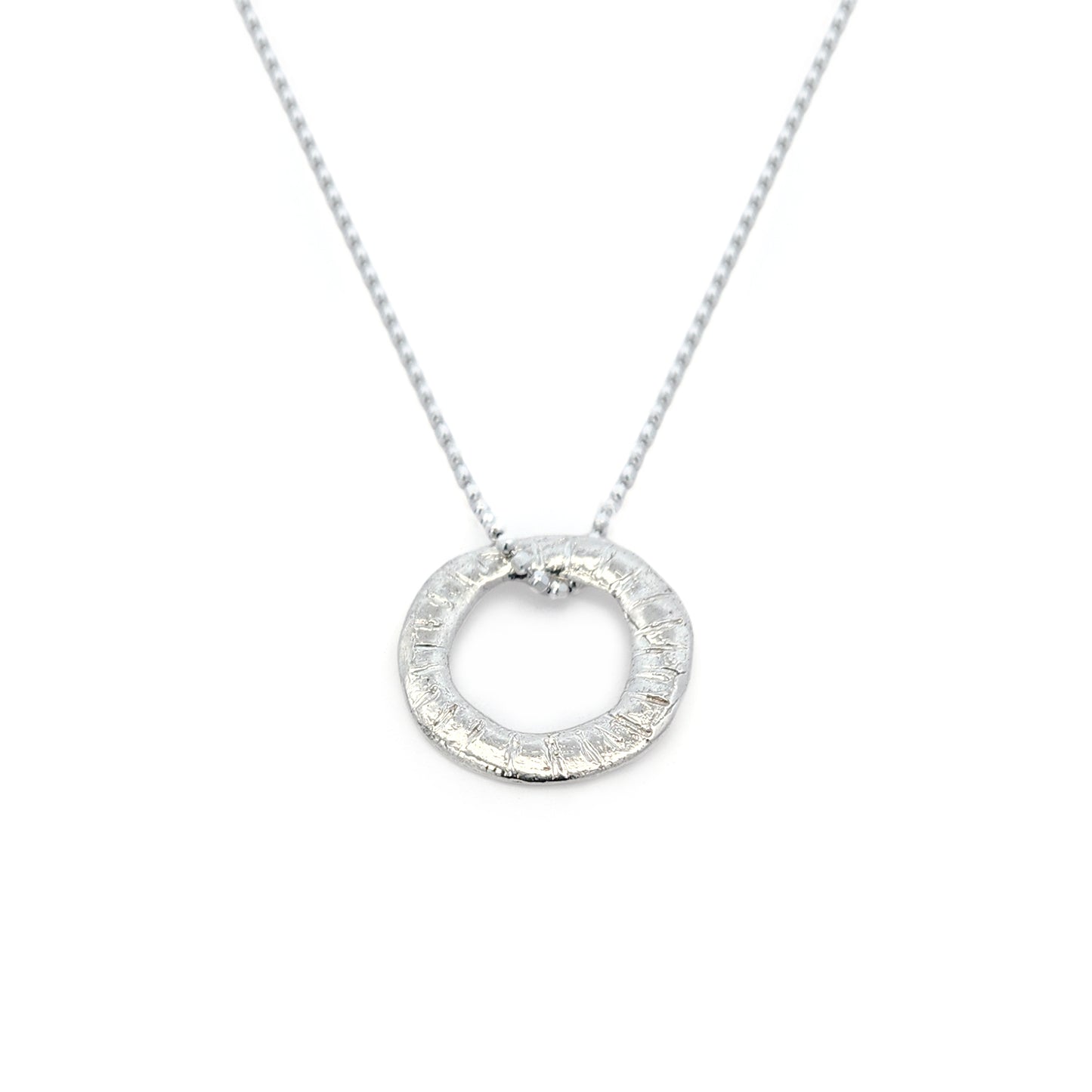 Organic Silver Notched Donut Pendant Necklace