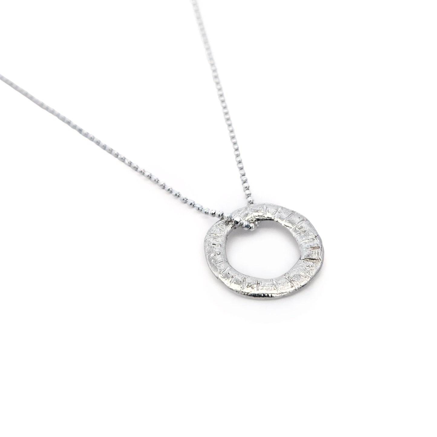Organic Silver Notched Donut Pendant Necklace