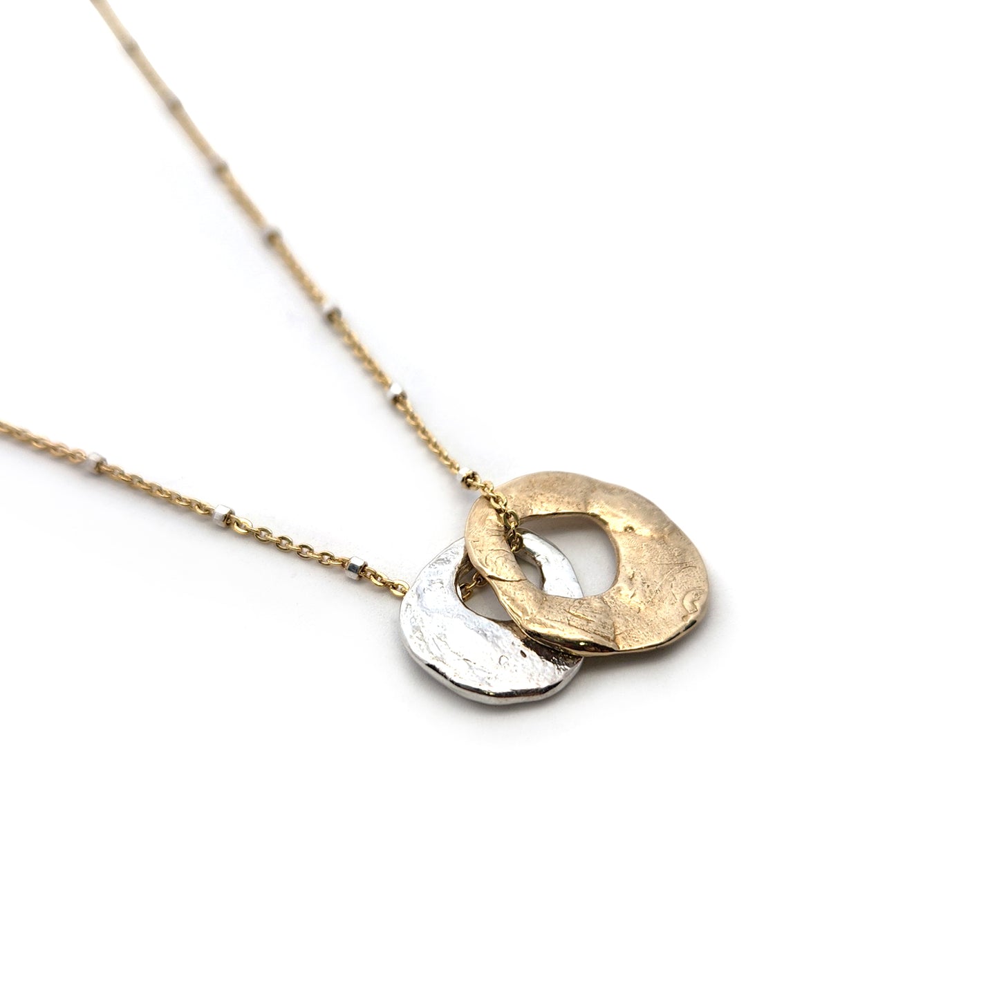 Mixed Bronze & Silver Organic Rings Necklace
