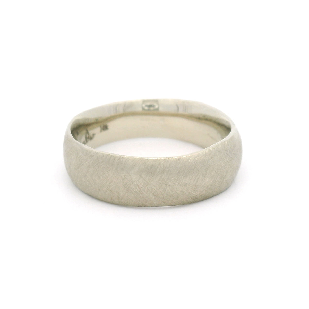 10K white gold 6.5mm organic brushed wedding band featuring gently wavy edges, a textured matte surface and a smooth comfort-fit interior.