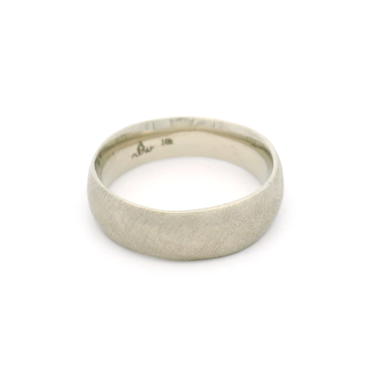 10K white gold 6.5mm organic brushed wedding band featuring gently wavy edges, a textured matte surface and a smooth comfort-fit interior.