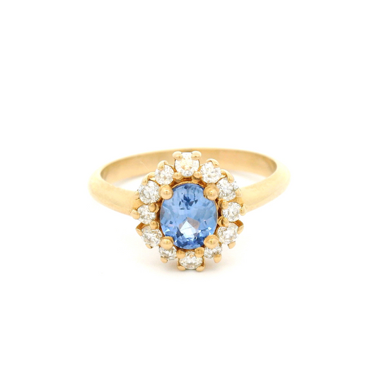 14k Yellow Ring with 0.80ct Oval Blue Sapphire Surrounded By Accent Moissanites