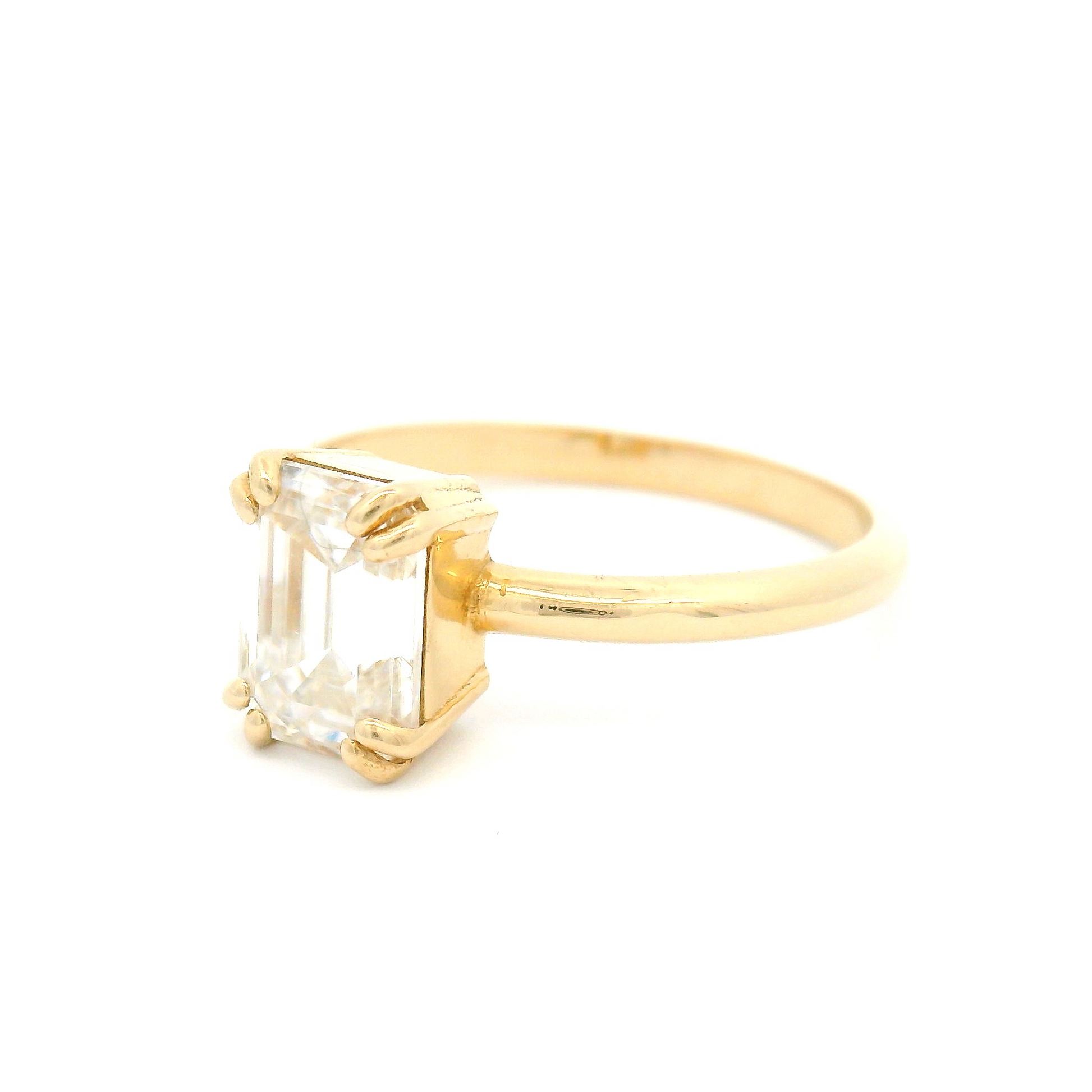 14k Yellow Solitaire set with 1.4ct Emerald Cut Moissanite