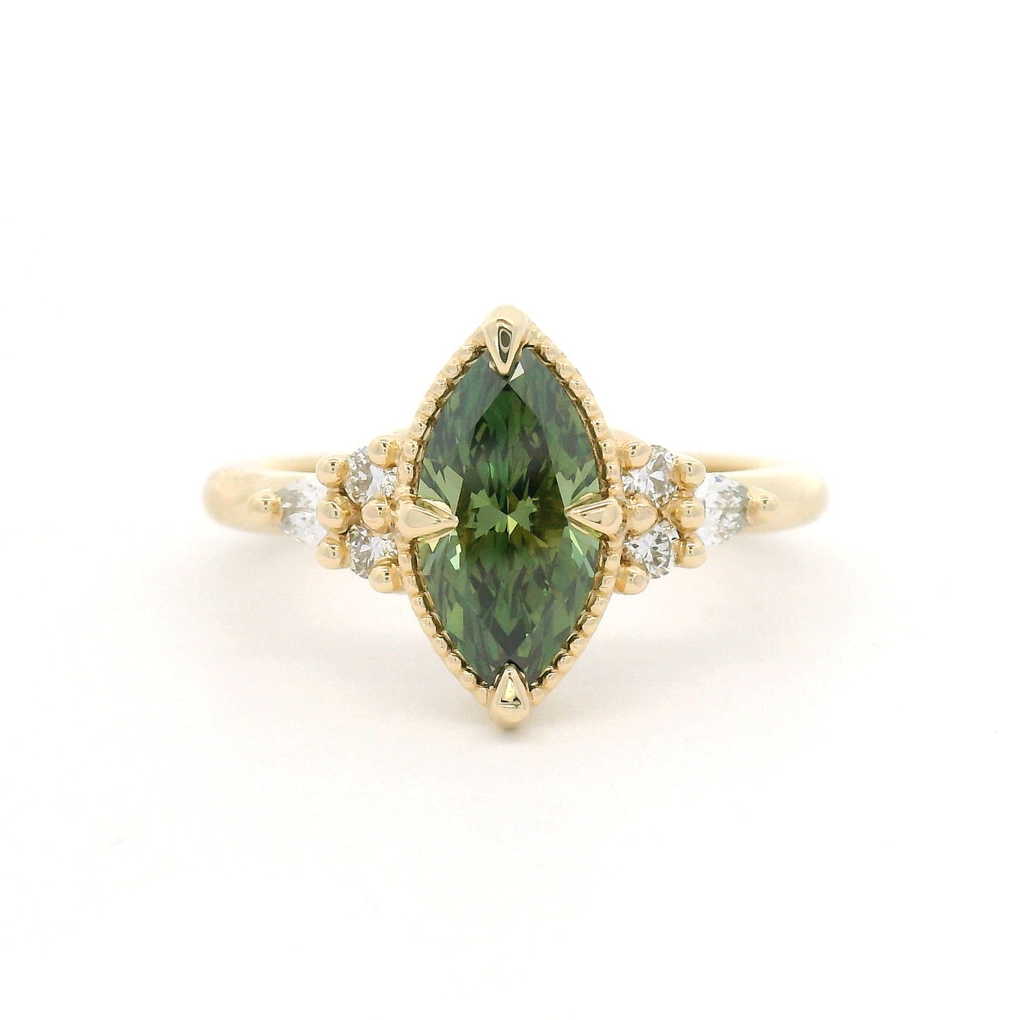 14K yellow gold engagement ring featuring a claw-set 1.01ct lab-grown Fancy Vivid Green marquise diamond with a milgrain edge and six lab-grown diamond accents totalling 0.19cts.