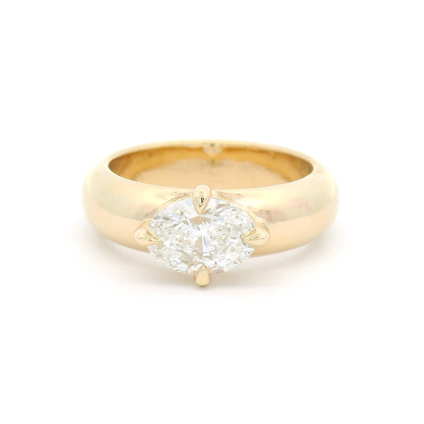 14K yellow gold solitaire engagement ring with a claw-set 1.02ct oval brilliant-cut lab-grown diamond on a softly domed band.