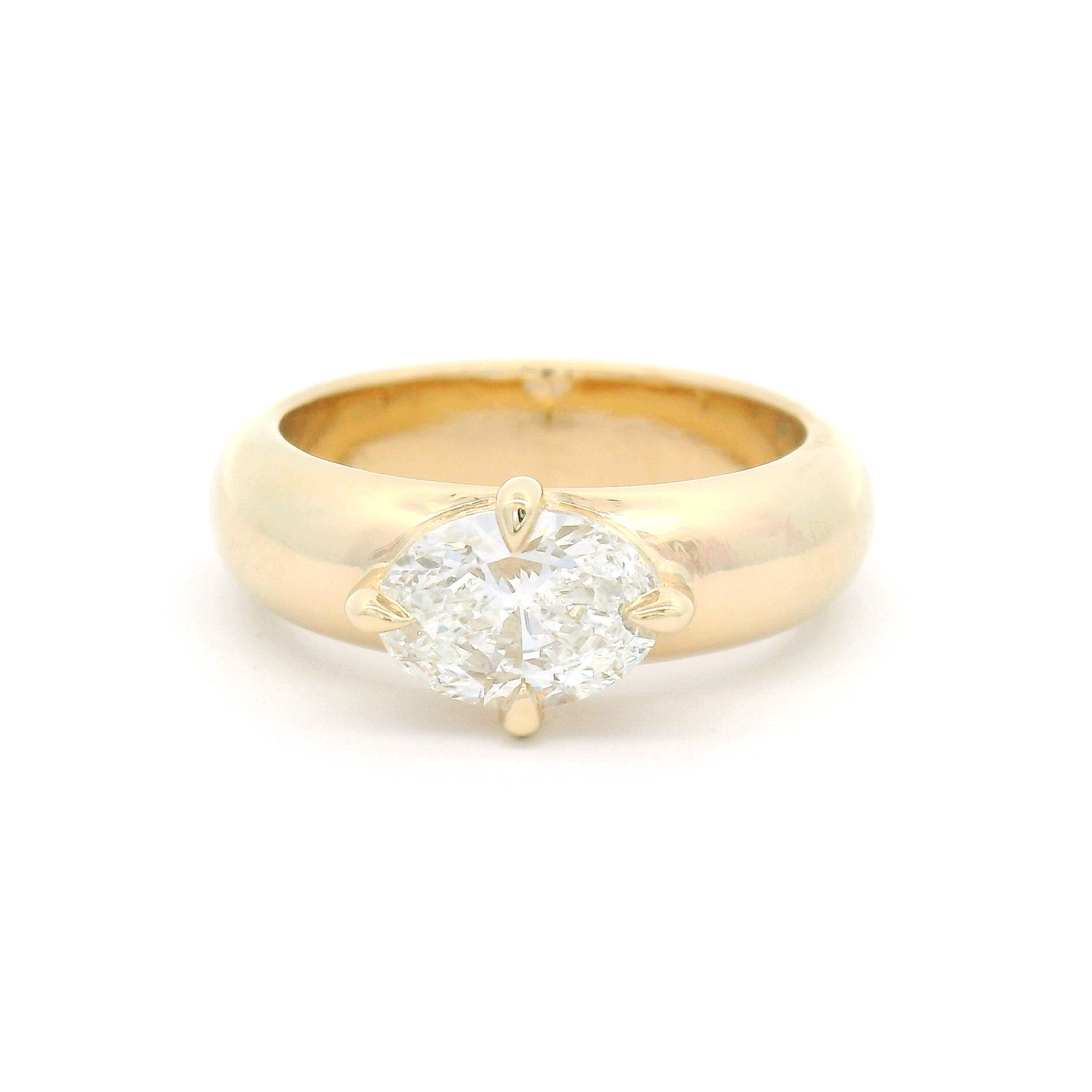 14K yellow gold solitaire engagement ring with a claw-set 1.02ct oval brilliant-cut lab-grown diamond on a softly domed band.