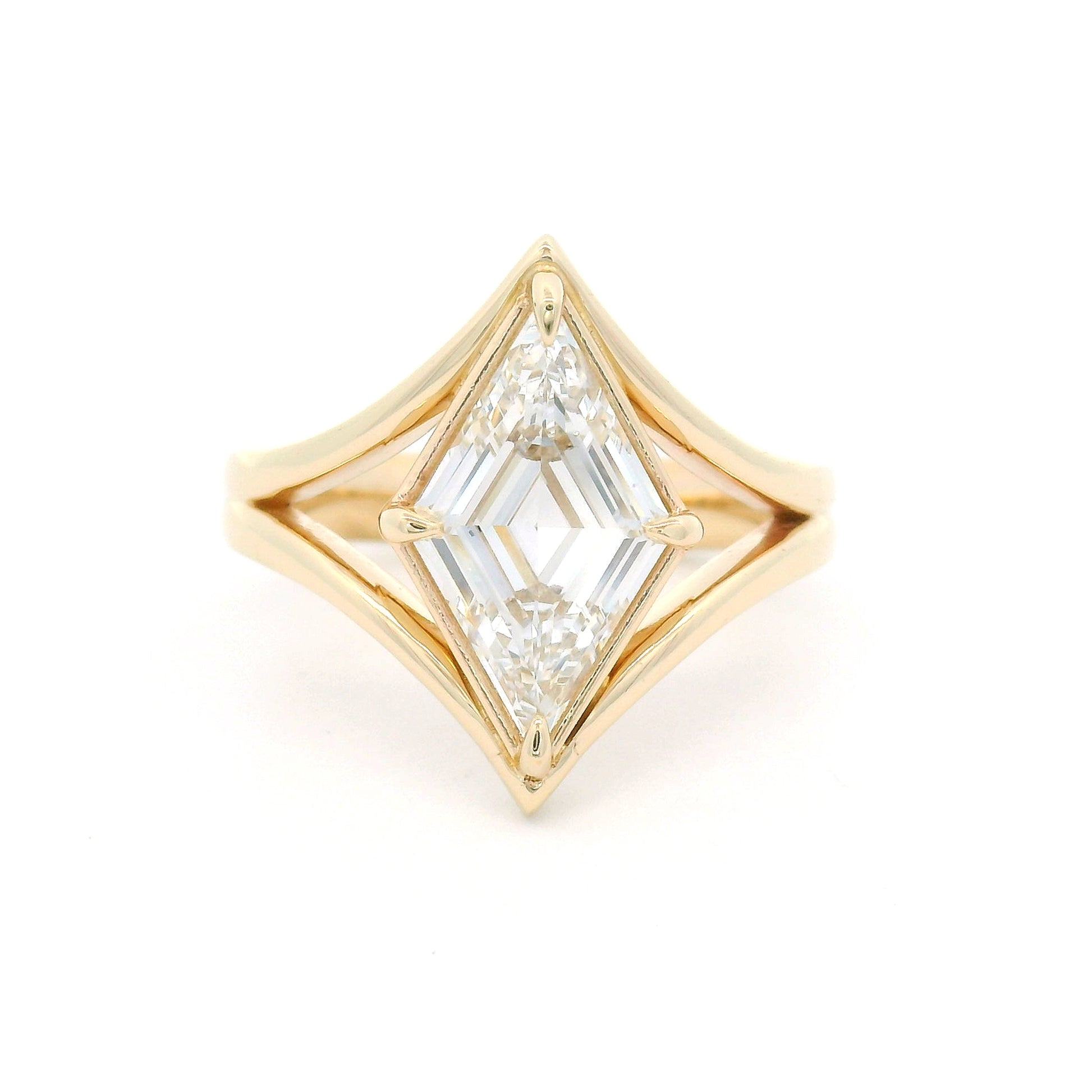 14K yellow gold solitaire engagement ring with a claw-set 1.80ct lozenge-shaped step-cut lab-grown diamond and sculptural split band.