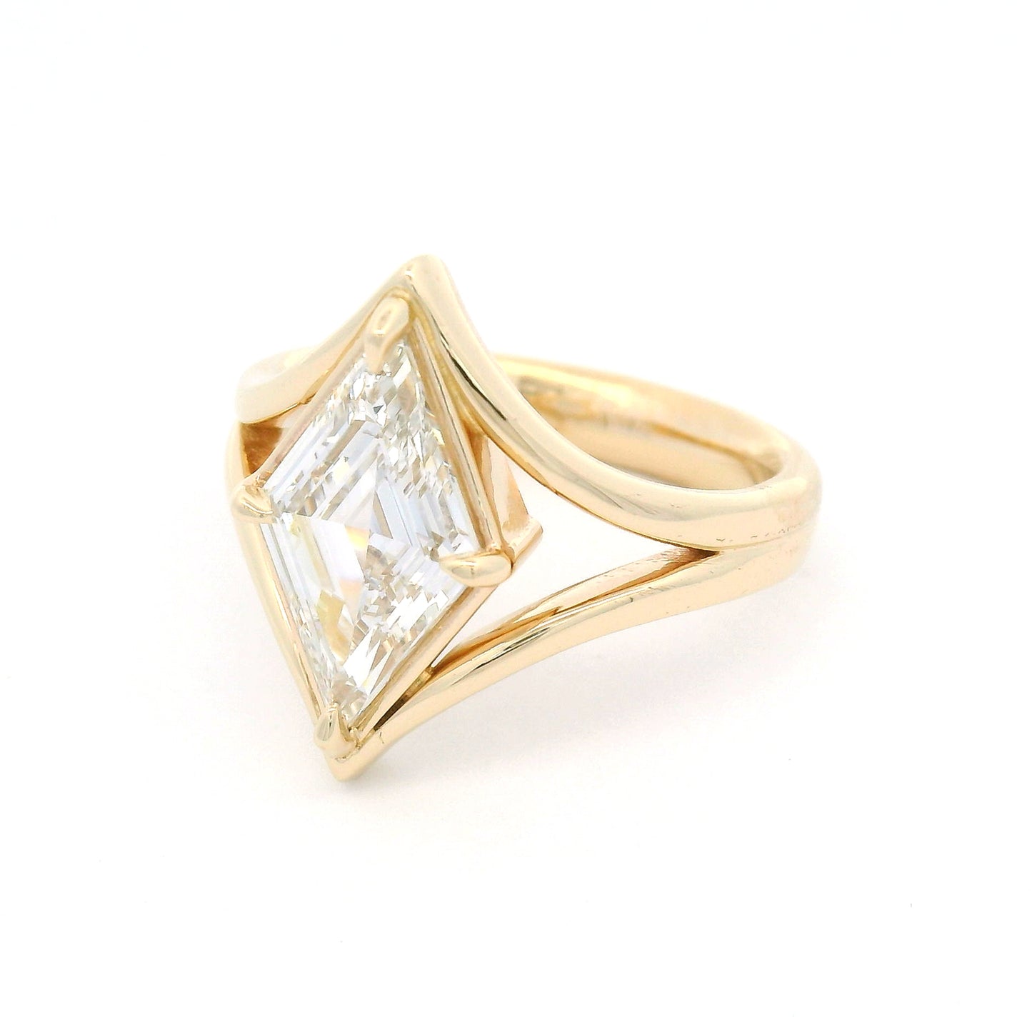 14K yellow gold solitaire engagement ring with a claw-set 1.80ct lozenge-shaped step-cut lab-grown diamond and sculptural split band.