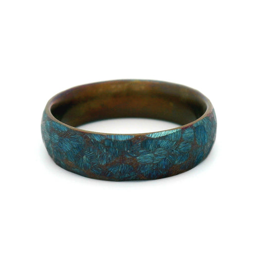 6mm stainless steel soft domed wedding band with textured anodized blue finish and comfort-fit interior.