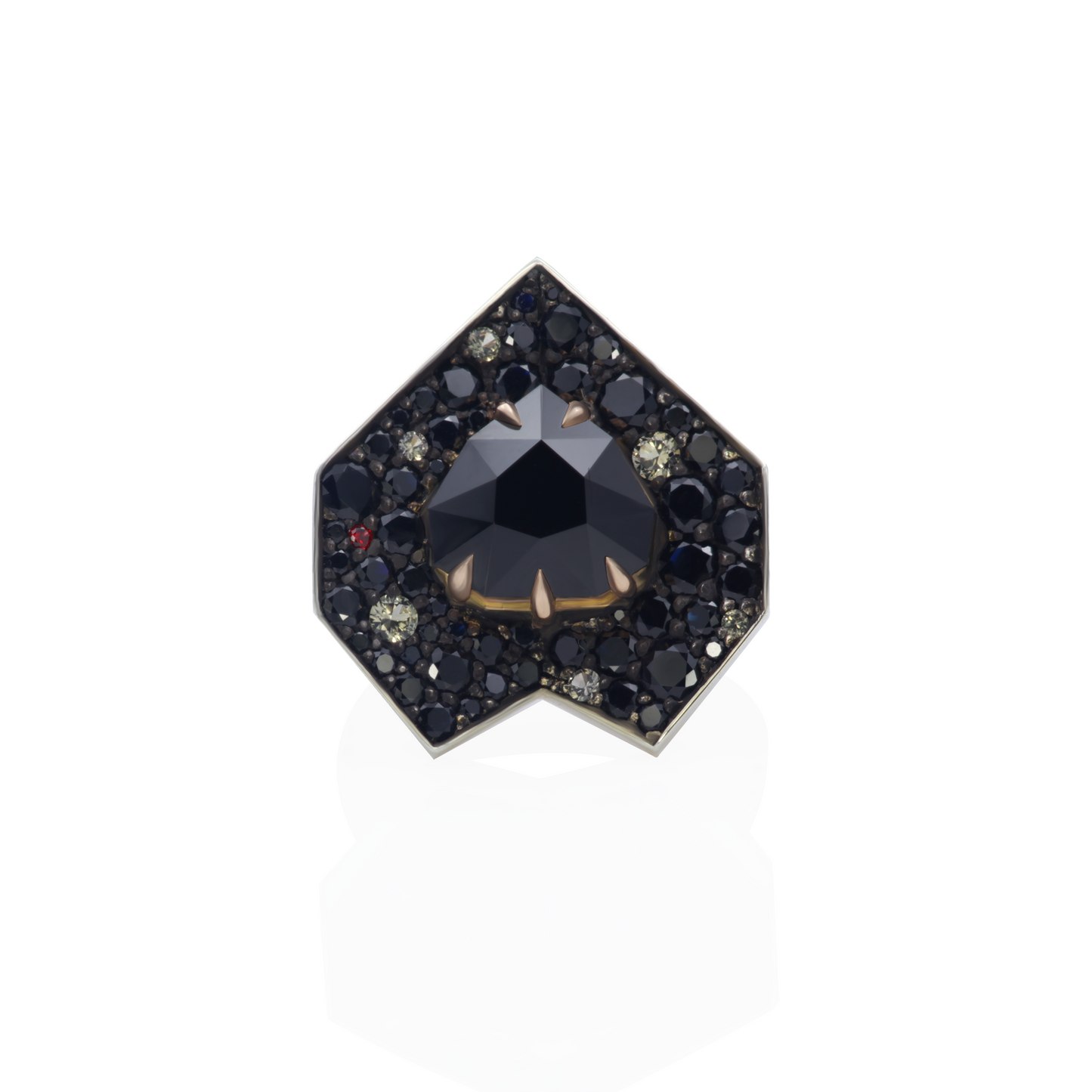 One-of-a-kind Eclipse Of The Heart ring in 18K rose gold and oxidized sterling silver with a 5.61ct natural black spinel, 5.98cts of black, yellow, and red sapphires in random snow pavé, fishtail-set shank, and decorative mises à jour.