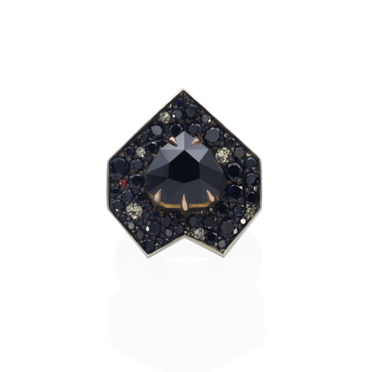 One-of-a-kind Eclipse Of The Heart ring in 18K rose gold and oxidized sterling silver with a 5.61ct natural black spinel, 5.98cts of black, yellow, and red sapphires in random snow pavé, fishtail-set shank, and decorative mises à jour.
