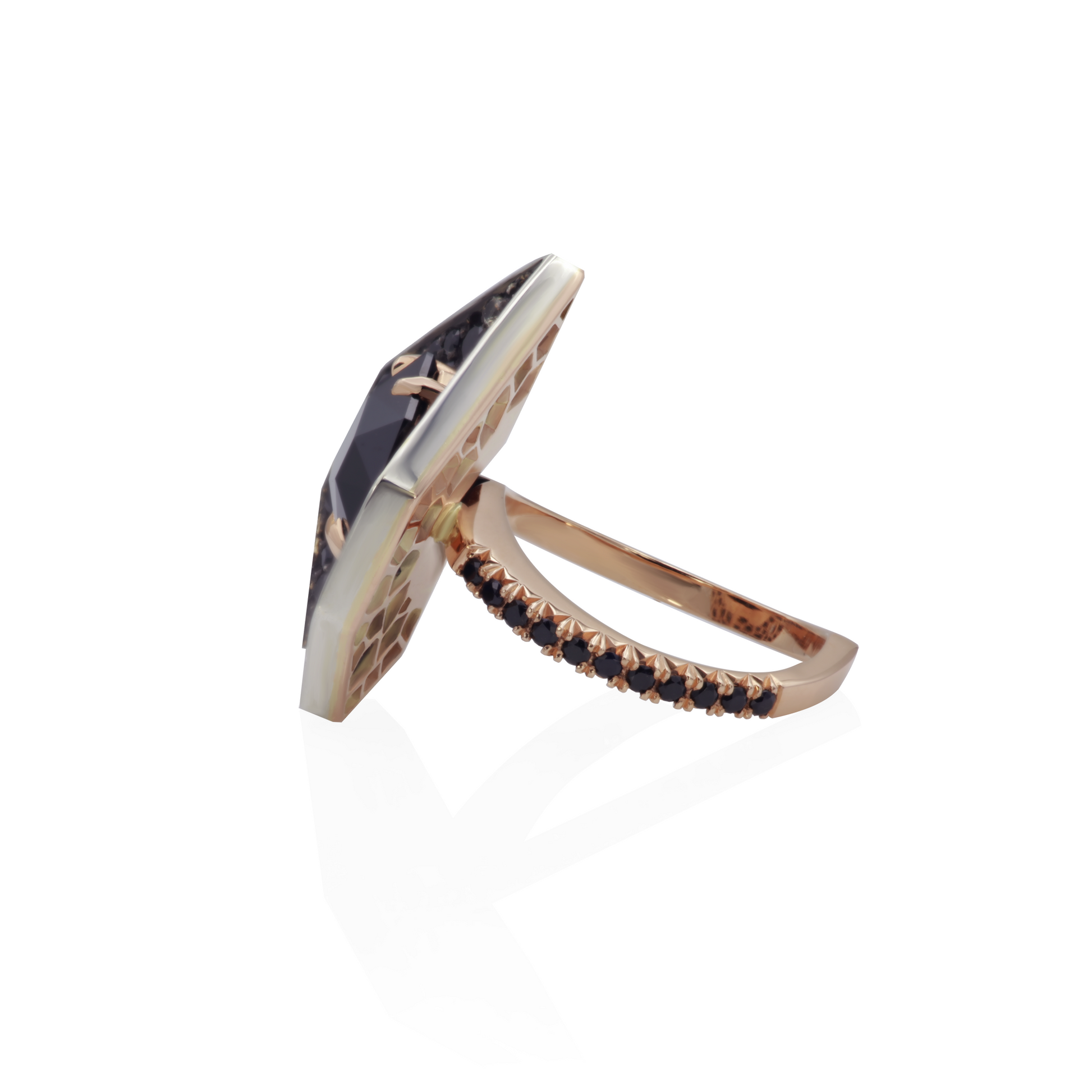One-of-a-kind Eclipse Of The Heart ring in 18K rose gold and oxidized sterling silver with a 5.61ct natural black spinel, 5.98cts of black, yellow, and red sapphires in random snow pavé, fishtail-set shank, and decorative mises à jour.