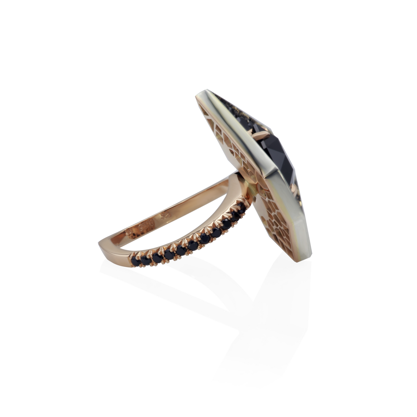 One-of-a-kind Eclipse Of The Heart ring in 18K rose gold and oxidized sterling silver with a 5.61ct natural black spinel, 5.98cts of black, yellow, and red sapphires in random snow pavé, fishtail-set shank, and decorative mises à jour.
