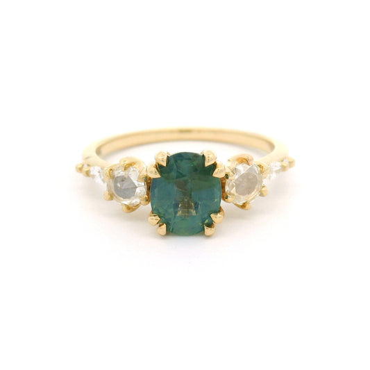 Handmade 14K yellow gold engagement ring with 1.24ct oval bluish-green sapphire and natural rose-cut, marquise-cut, and round brilliant diamonds on a 1.6mm band.
