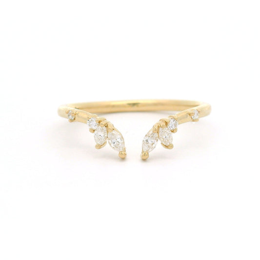 14K yellow gold contoured open band set with marquise and round white diamonds.