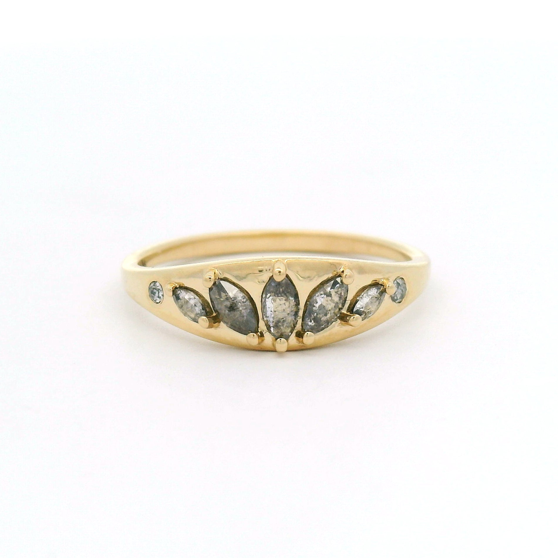 14K yellow gold ring with five salt & pepper marquise diamonds in a fan pattern and two round diamond accents on a tapered band.