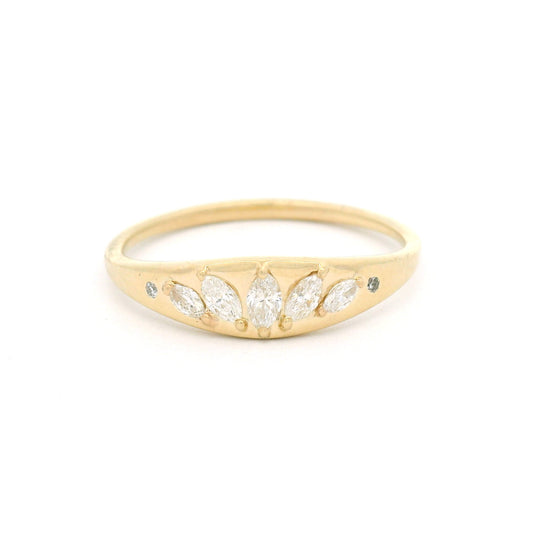 14K yellow gold ring with five flush-set marquise diamonds and two round brilliant-cut diamonds on a smooth tapered 1.4mm band.