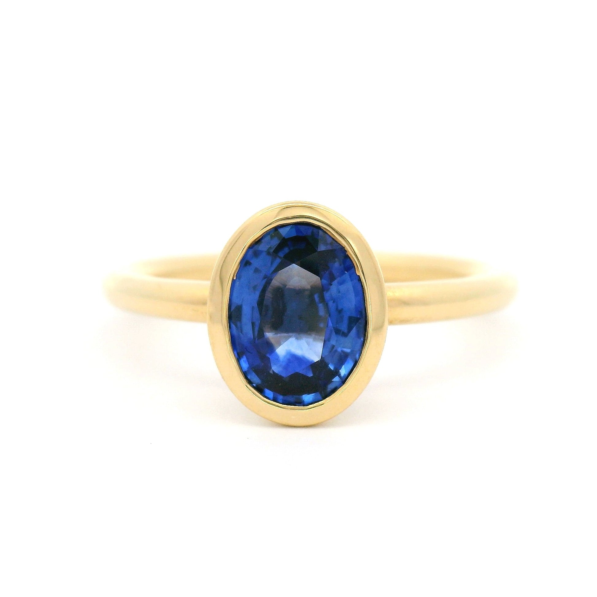 18k Yellow Bezel-Set Solitaire with Natural 1.16ct Blue Oval Sapphire