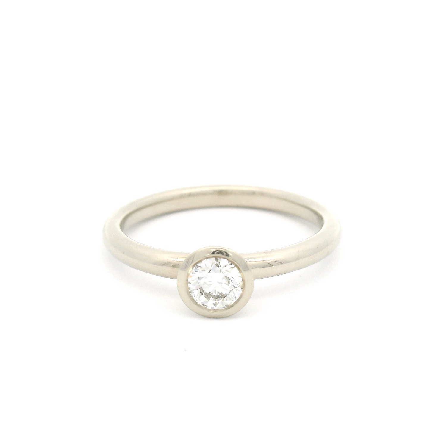 14k White Bezel Set Solitaire with 0.31ct Diamond