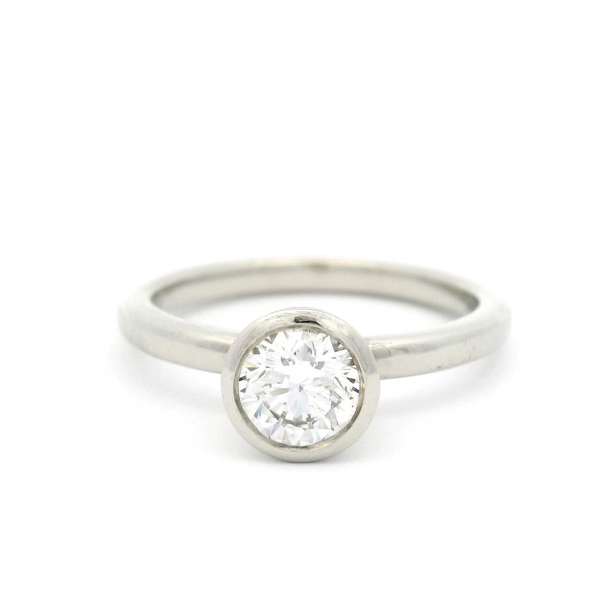 14k White Bezel Set Solitaire with 0.64ct Diamond