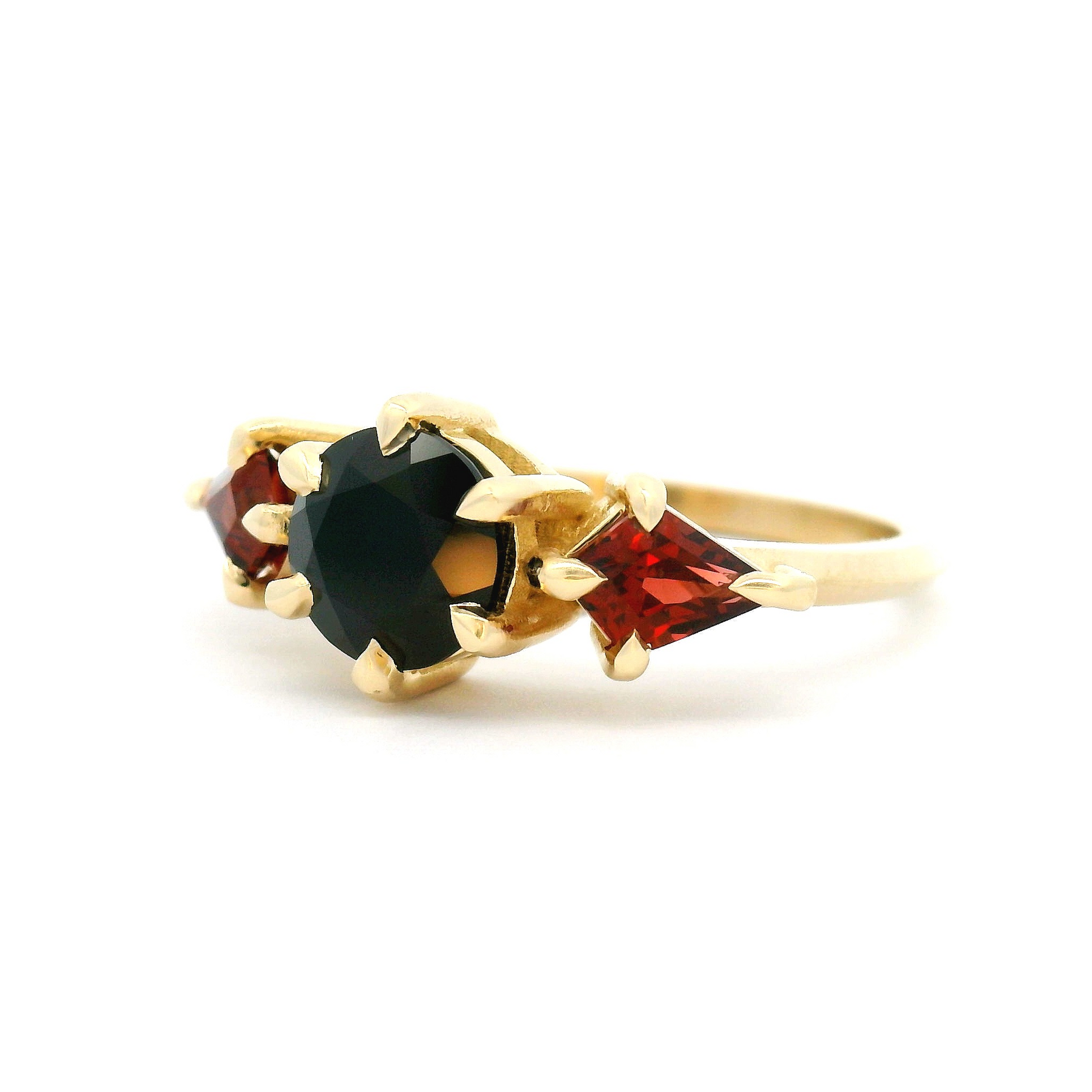 10k Yellow Three-Stone Ring with 1.31ct Black Spinel and 1.02cts Almandite Garnets