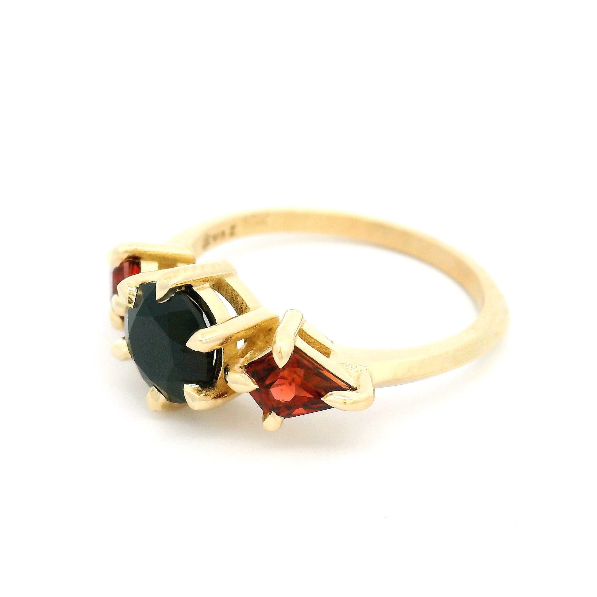 10k Yellow Three-Stone Ring with 1.31ct Black Spinel and 1.02cts Almandite Garnets