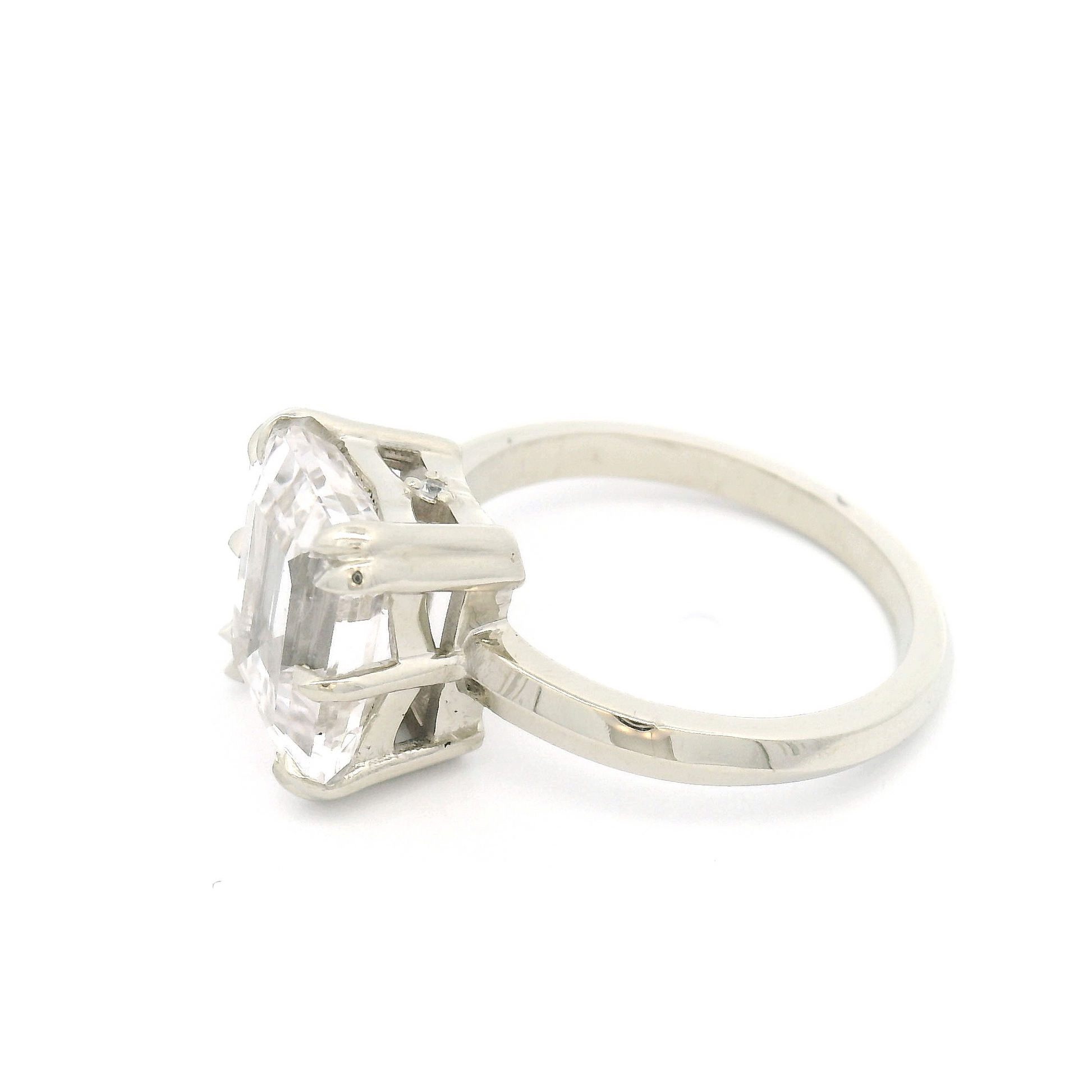 10k White Solitaire with 2.8ct Emerald-Cut White Sapphire and Accent Diamonds