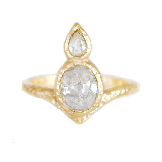 14K yellow gold organic Chevron ring with bezel-set 1.37ct oval rose-cut diamond and 0.15ct pear-shaped rose-cut diamond arranged vertically down the finger.